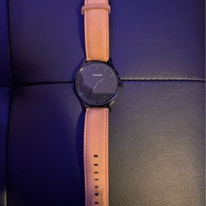 MVMT watch with tan band